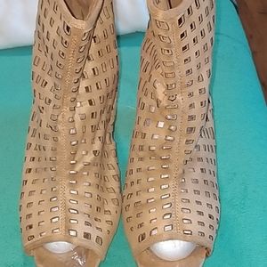 I'm selling two pairs of heels size 12 tan and blu